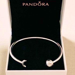 Sterling silver Pandora bangle with charm attached